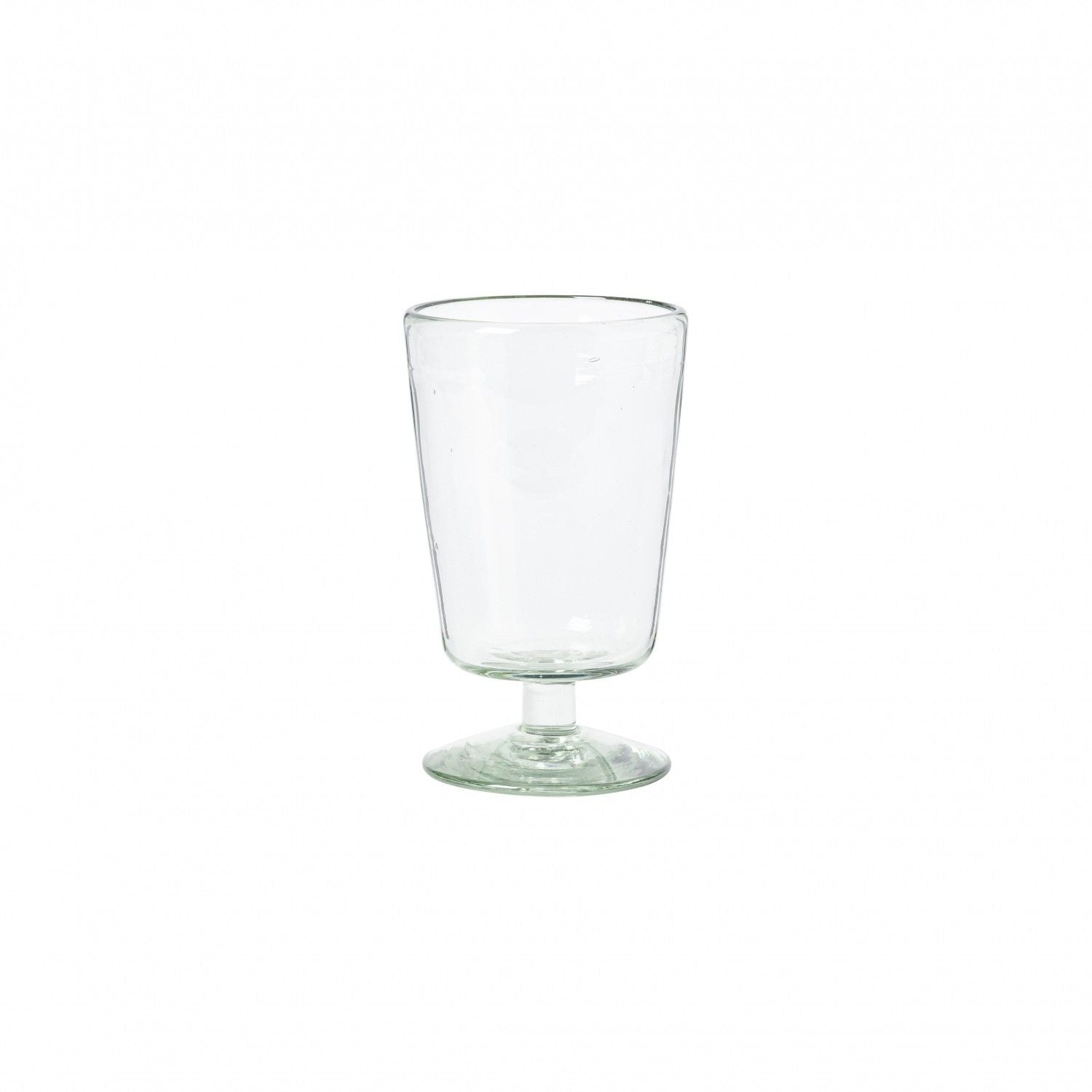 Three empty Margarida Recycled Glasses vessels of varying heights and shapes, made by Casafina Living, rest on a white surface.