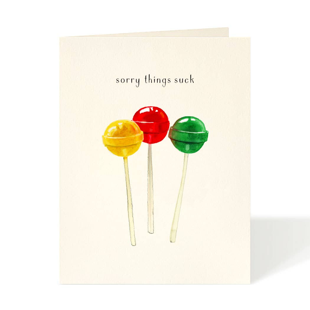 Greeting card by Felix Doolittle with artwork of 3 lollipops and the sentiment above saying &quot;sorry things suck&quot;. 