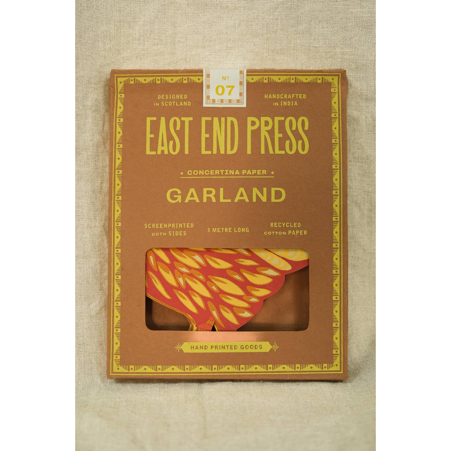 Front of package of the chickens concertina garland. 