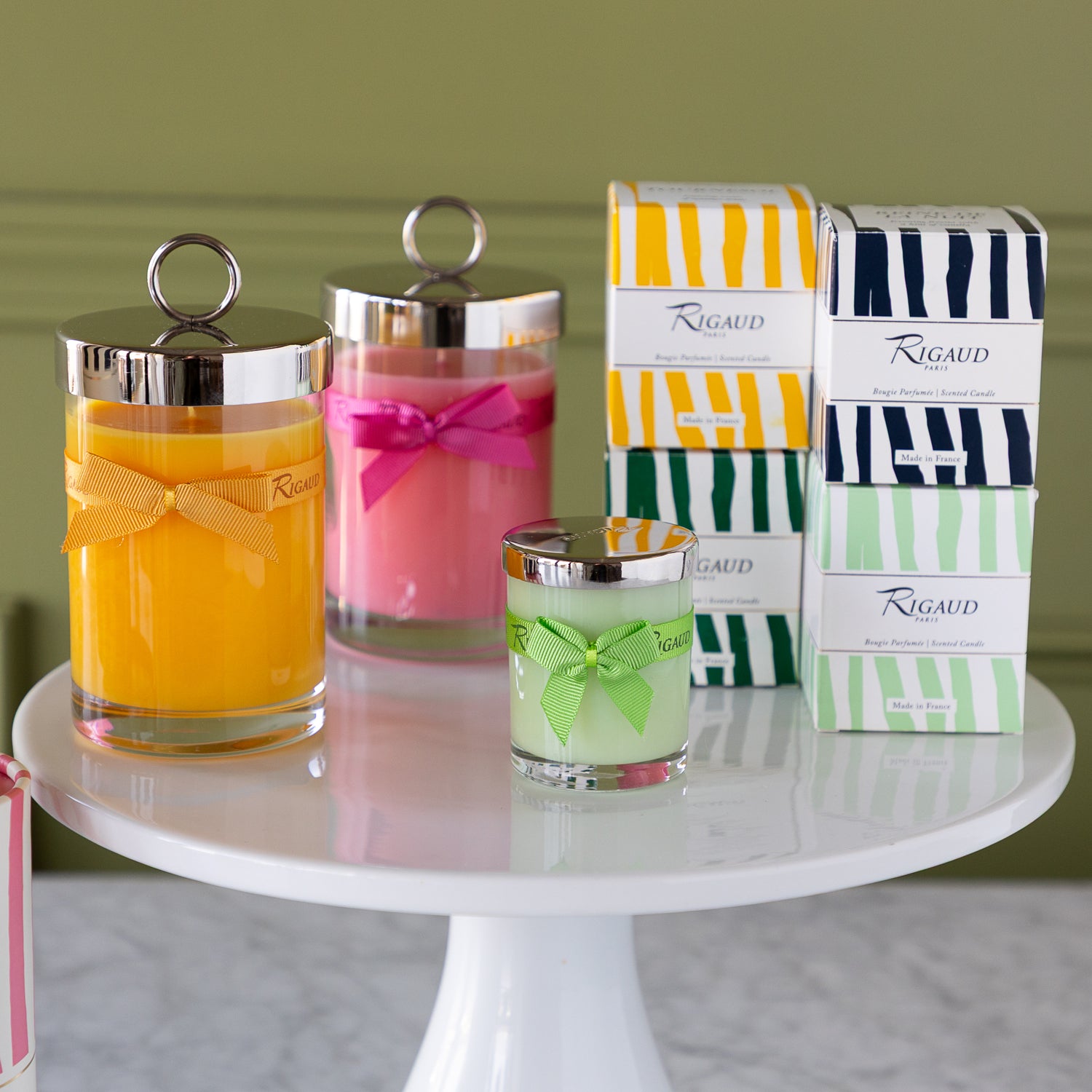 Rigaud 230g and 60g candles in assorted scents with coordinating boxes.
