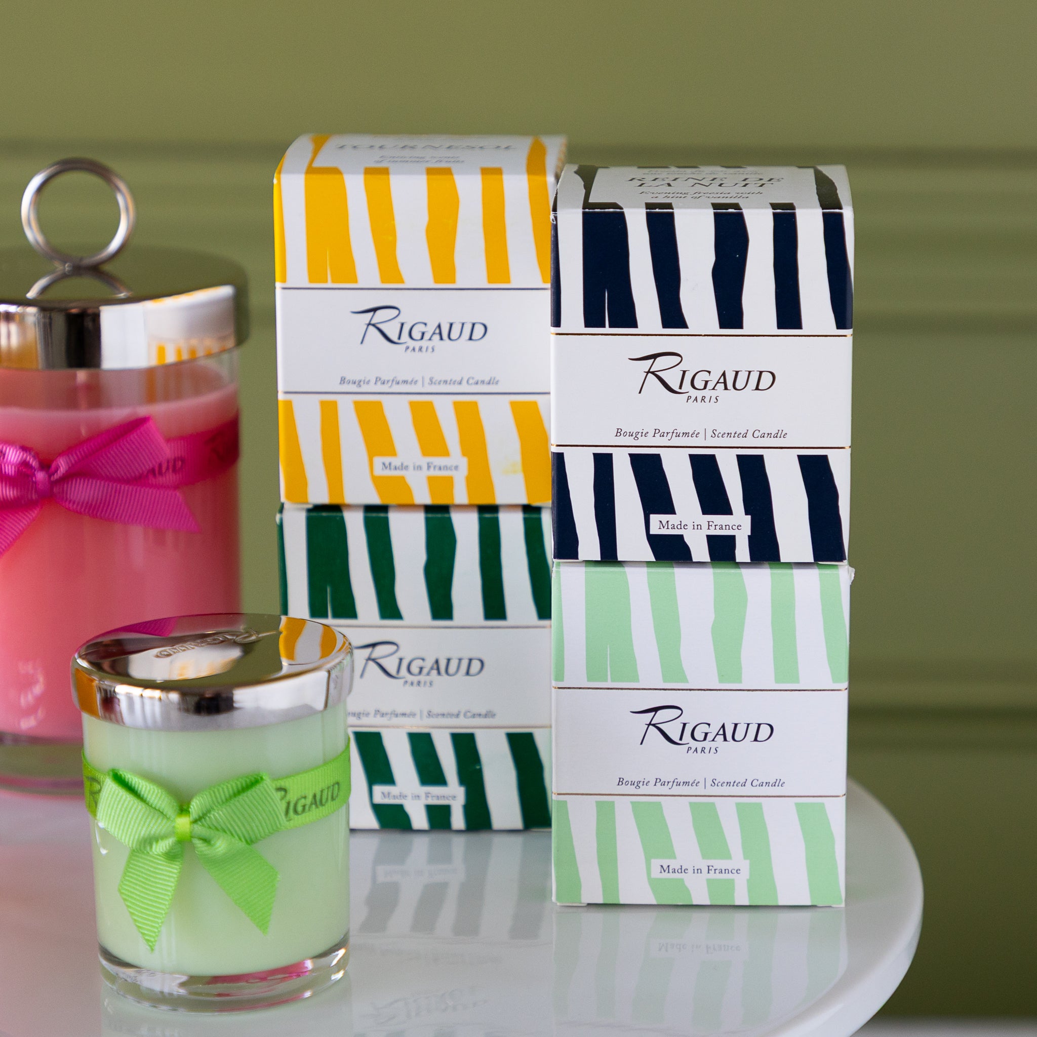 Rigaud 60g candles in assorted scents with coordinating boxes.