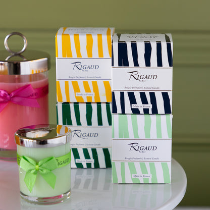 Rigaud 60g candles in assorted scents with coordinating boxes.