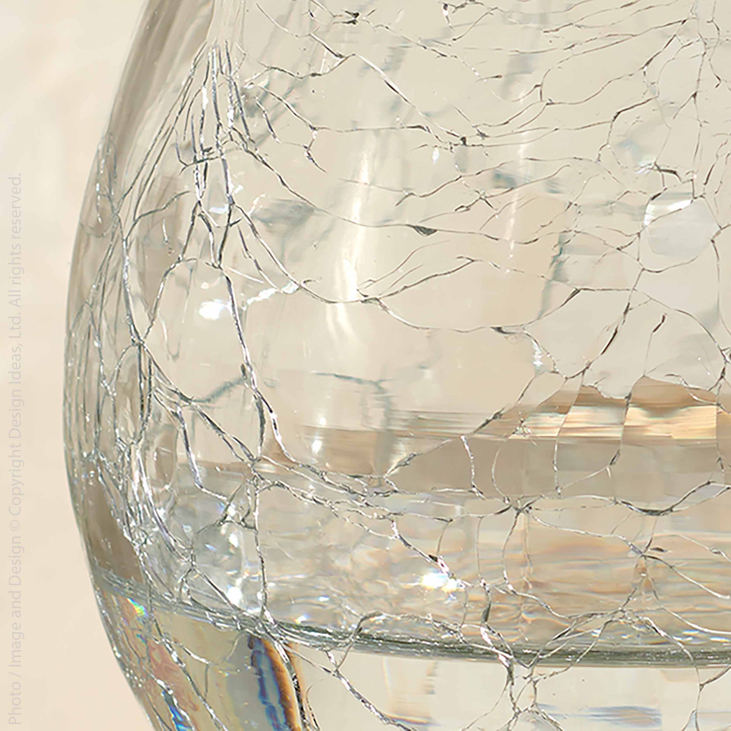 A glass of wine on a table next to Norwell Goblets by Design Ideas.