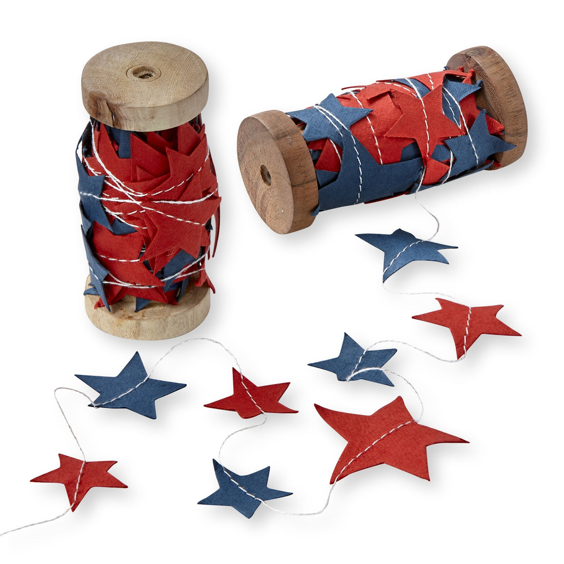 Red and blue stars made of paper sewn onto a string wrapped around a wood spool.