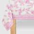Pink French Toile Paper Tablecloth on a table.