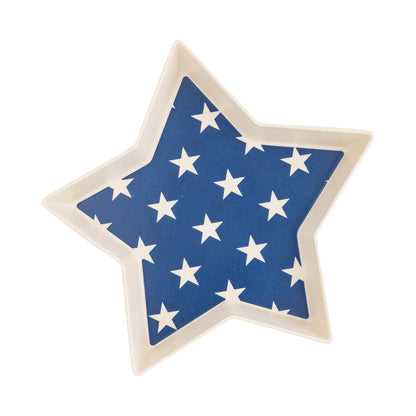 Star shaped tray with blue background and white stars inside. 
