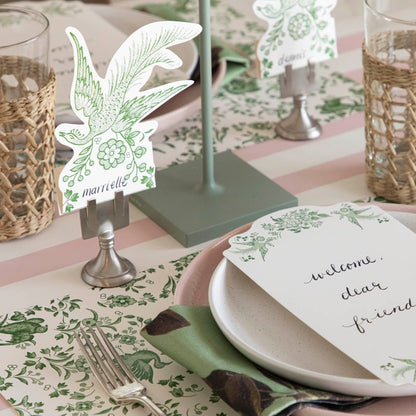 A table setting with place settings and a Zafferano Sage Cordless Lamp.