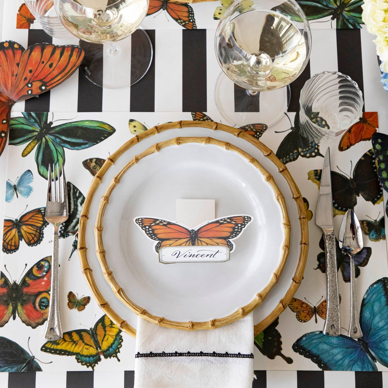 A variety of colorful butterflies displayed against a light background on Hester &amp; Cook&