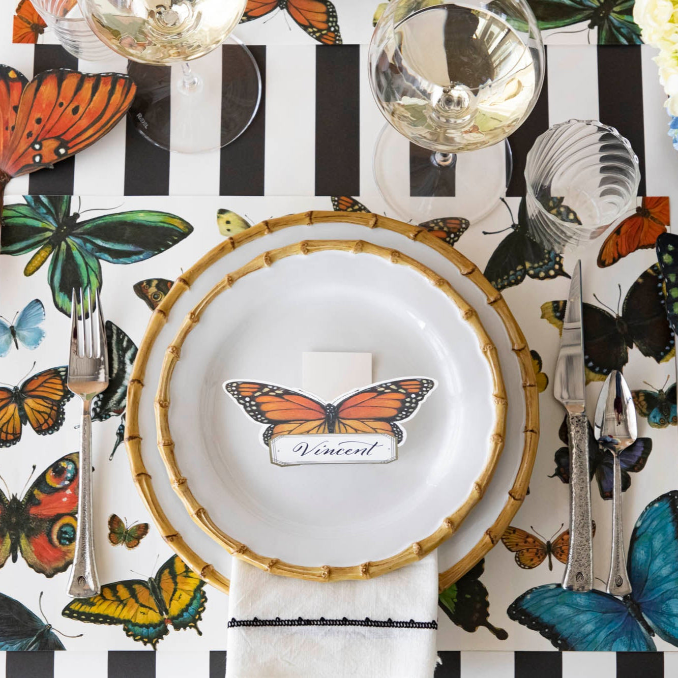 A variety of colorful butterflies displayed against a light background on Hester &amp; Cook&