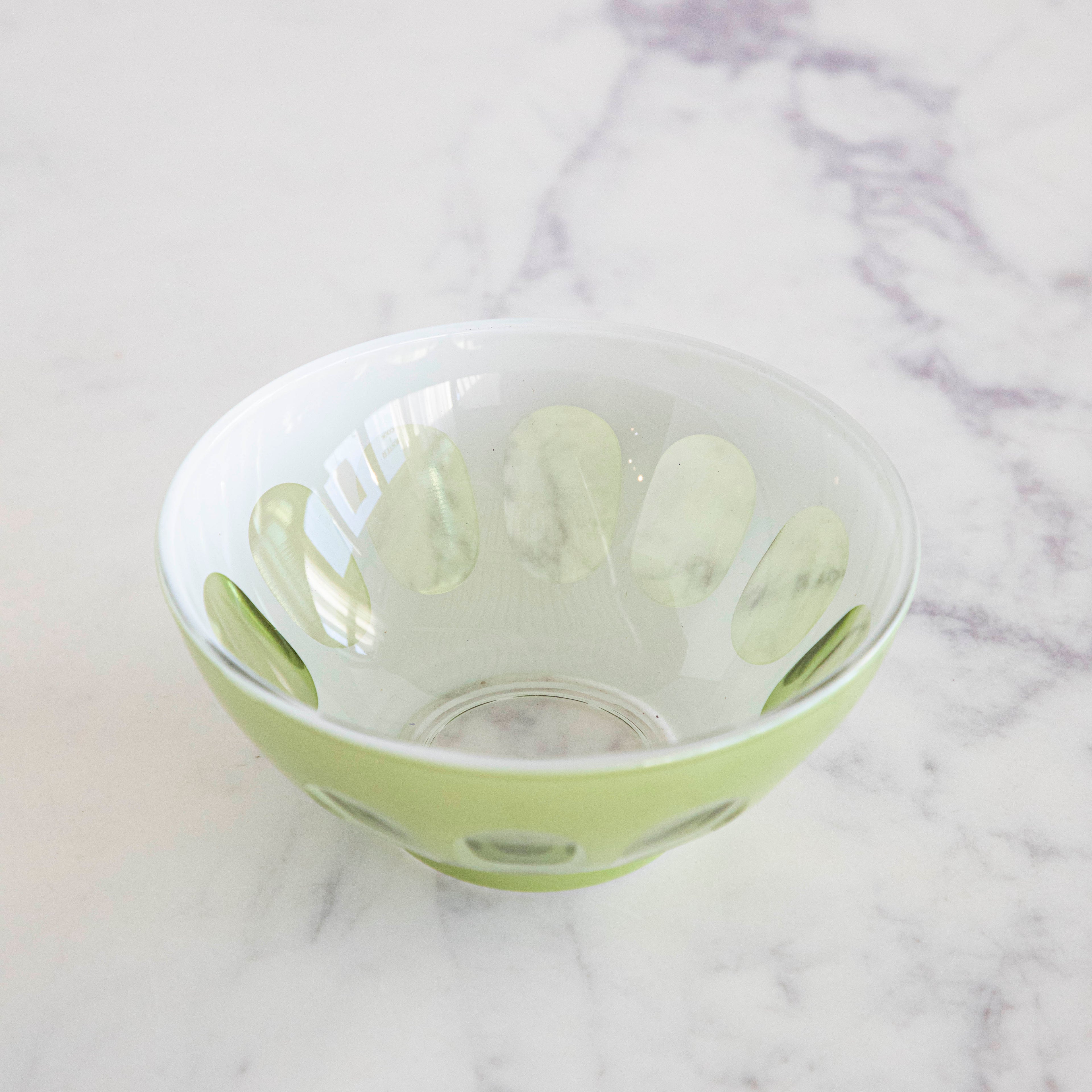 The inside of a Rialto Pale Sage Glass Bowl showing its opaque center.