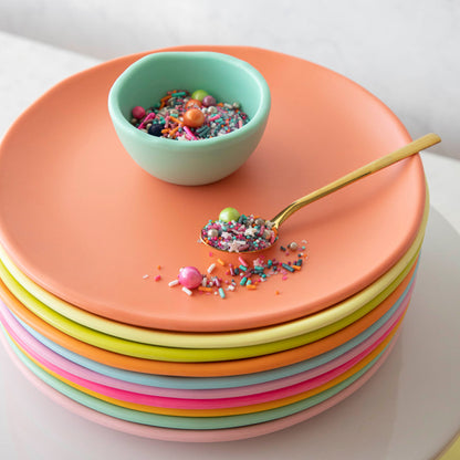 A stack of colorful, Glitterville&