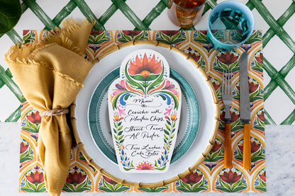 The Fiesta Floral Tile Placemat used in a festive place setting, from above.