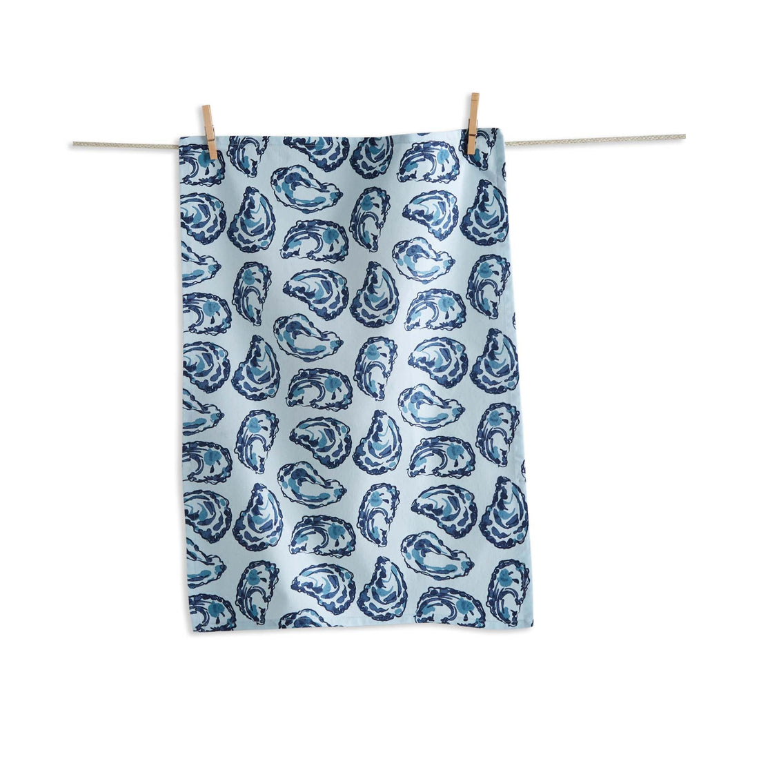 Oyster Dishtowel hanging on a clothes line, featuring screenprinted images of blue oysters.