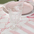 Two Casafina Living Gomos Water Glasses on a wooden table.