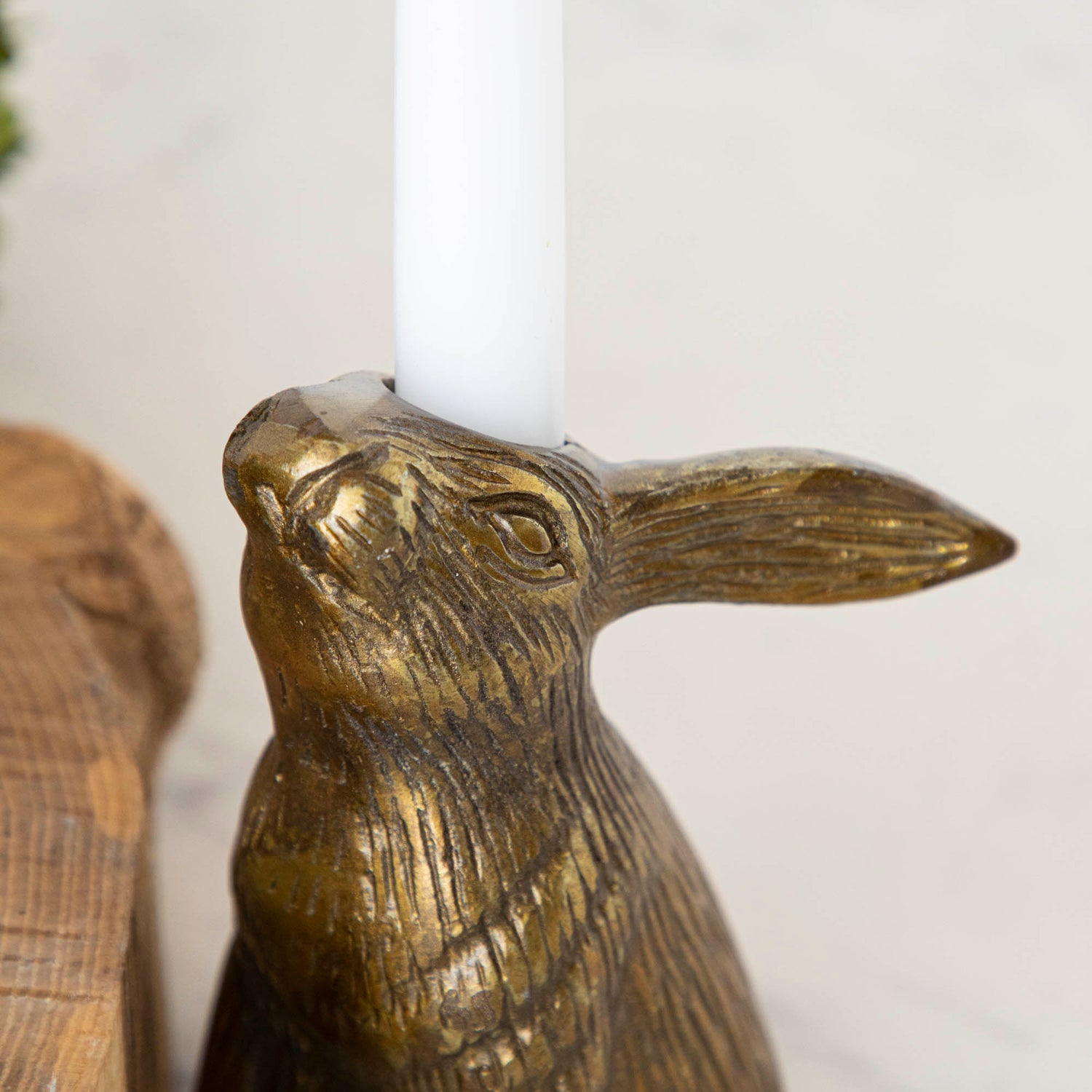 Halcyon Hare Head Candle Holder with a candle in it.