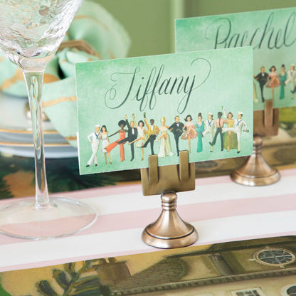 An elegant tablescape featuring High Kick Place Cards at each place setting.