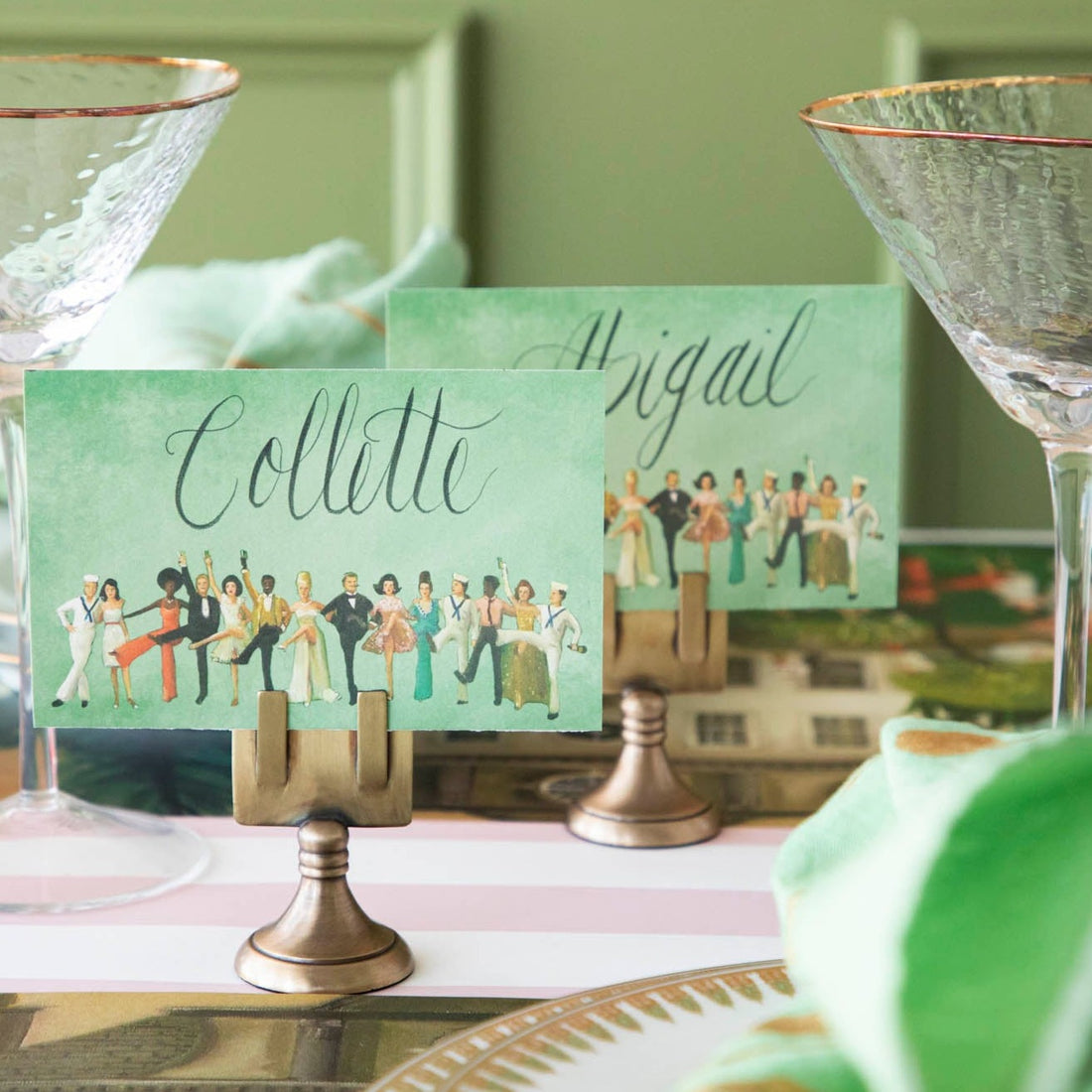 An elegant tablescape featuring High Kick Place Cards at each place setting.