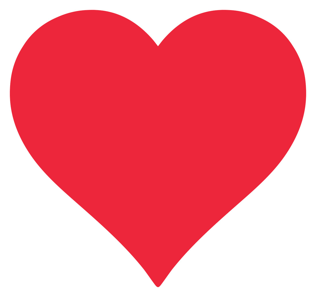 A die-cut paper heart placemat in solid bright red.