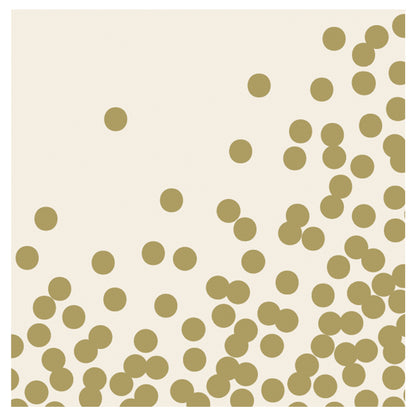 A square, cream cocktail napkin with a scatter of uniform gold dots concentrated to the lower and right sides, with none towards the upper left corner.