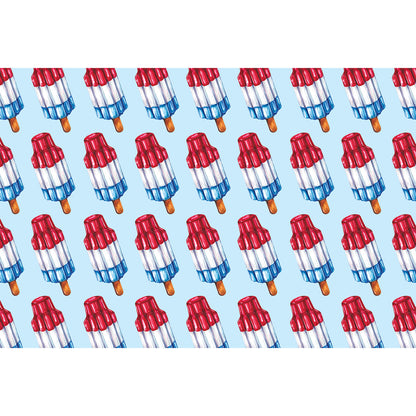 The Rocket Pop Placemat featuring a repeated pattern of rocket pops on a blue background.
