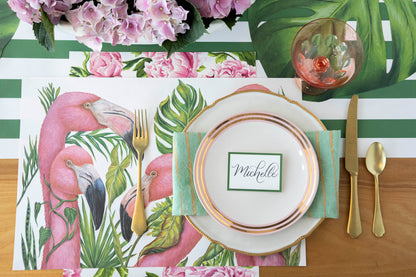 A table setting with Dark Green Frame Place Card placemats for guests and Hester &amp; Cook silverware.