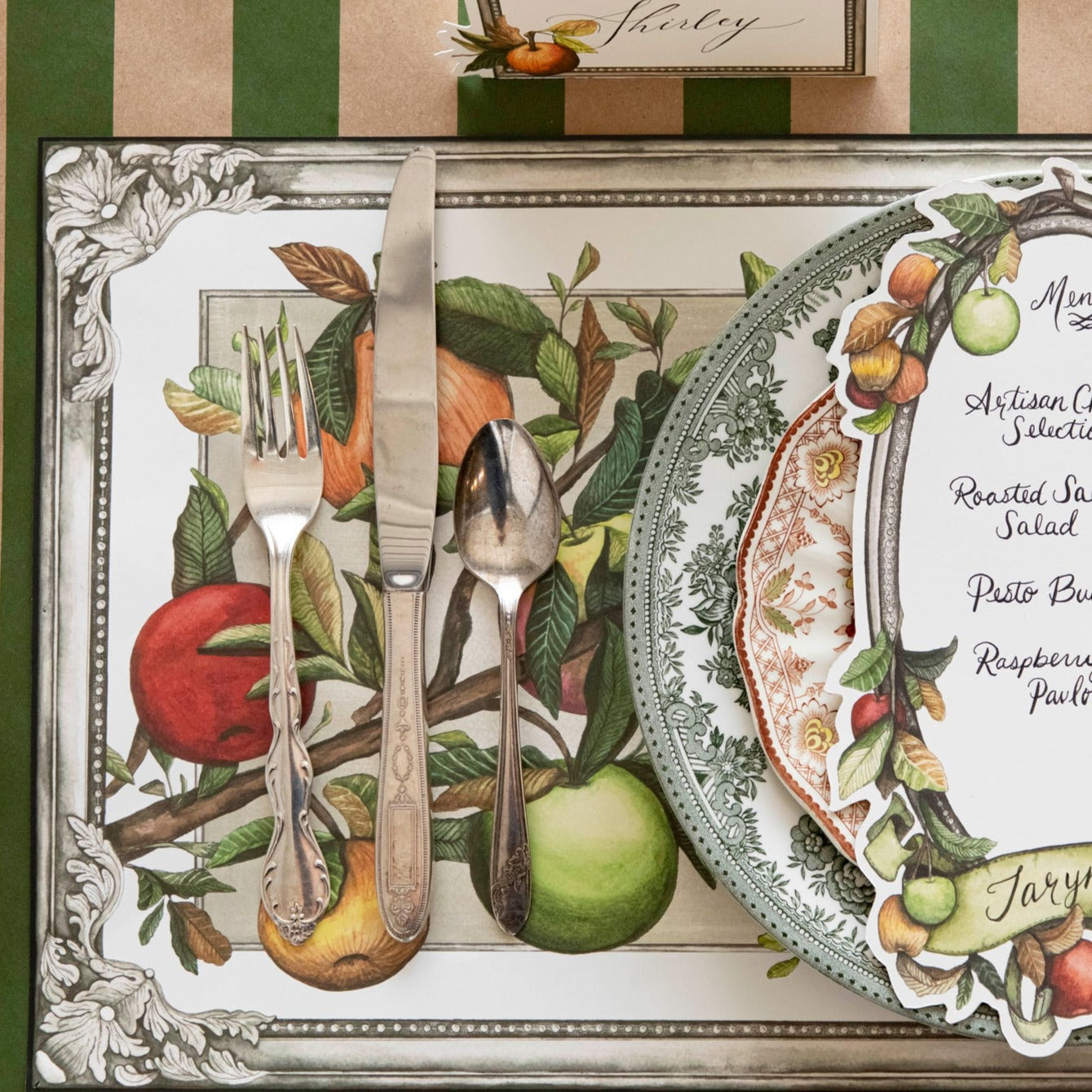Close-up of the Kraft Green Classic Stripe Runner under an elegant place setting.