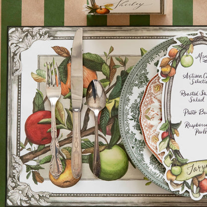 Close-up of the Kraft Green Classic Stripe Runner under an elegant place setting.