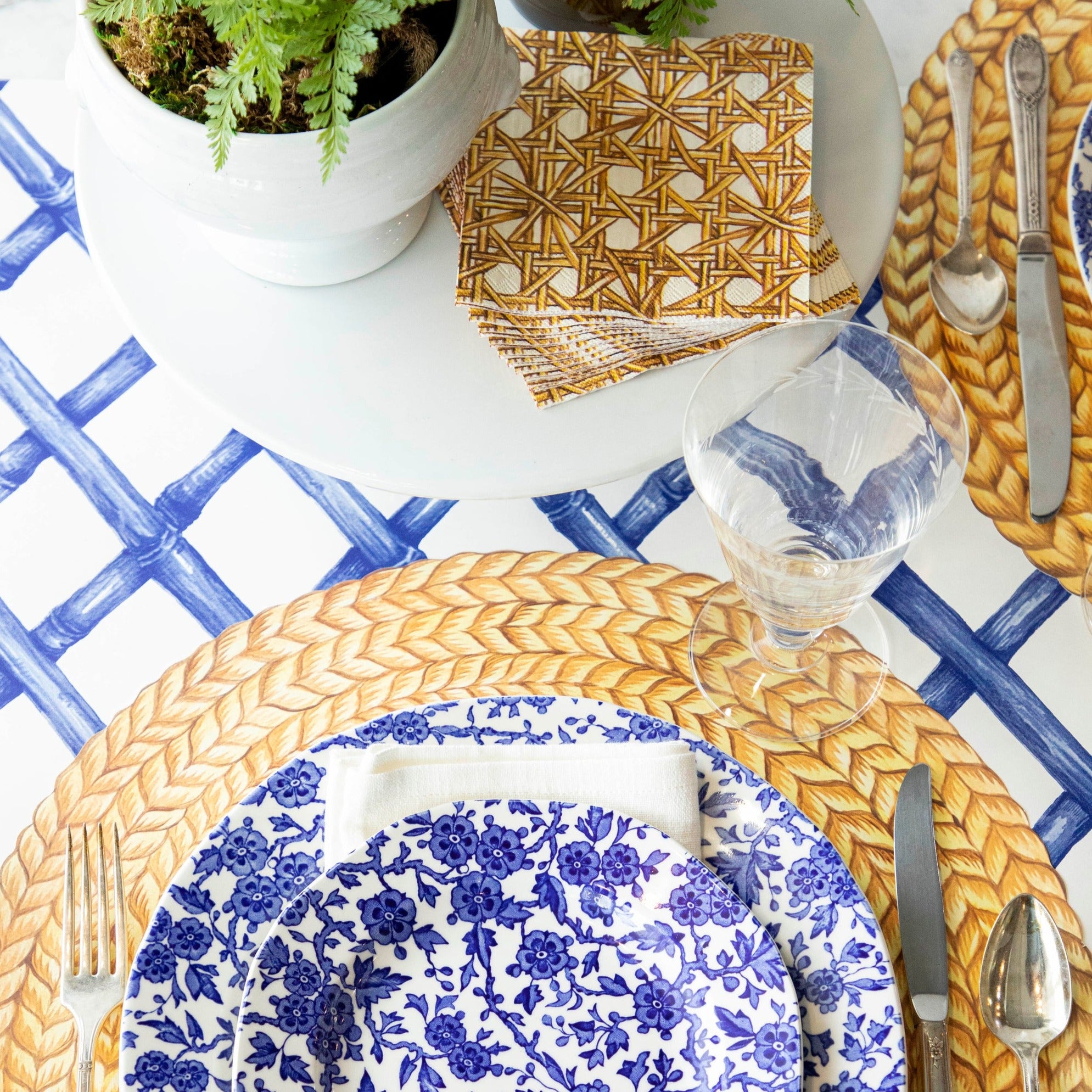 The Blue Lattice Runner under an elegant table setting, from above. 