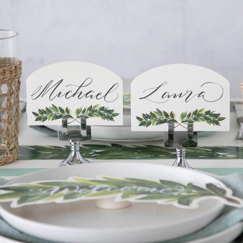 Two Laurel Place Cards labeled &quot;Michael&quot; and &quot;Laura&quot; as part of an elegant place setting.