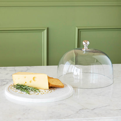 Chocolate muffins under a Bidk Home Marble &amp; Glass Food Dome with Knob, 11.5&quot; Diameter, presented on a white marble plate.