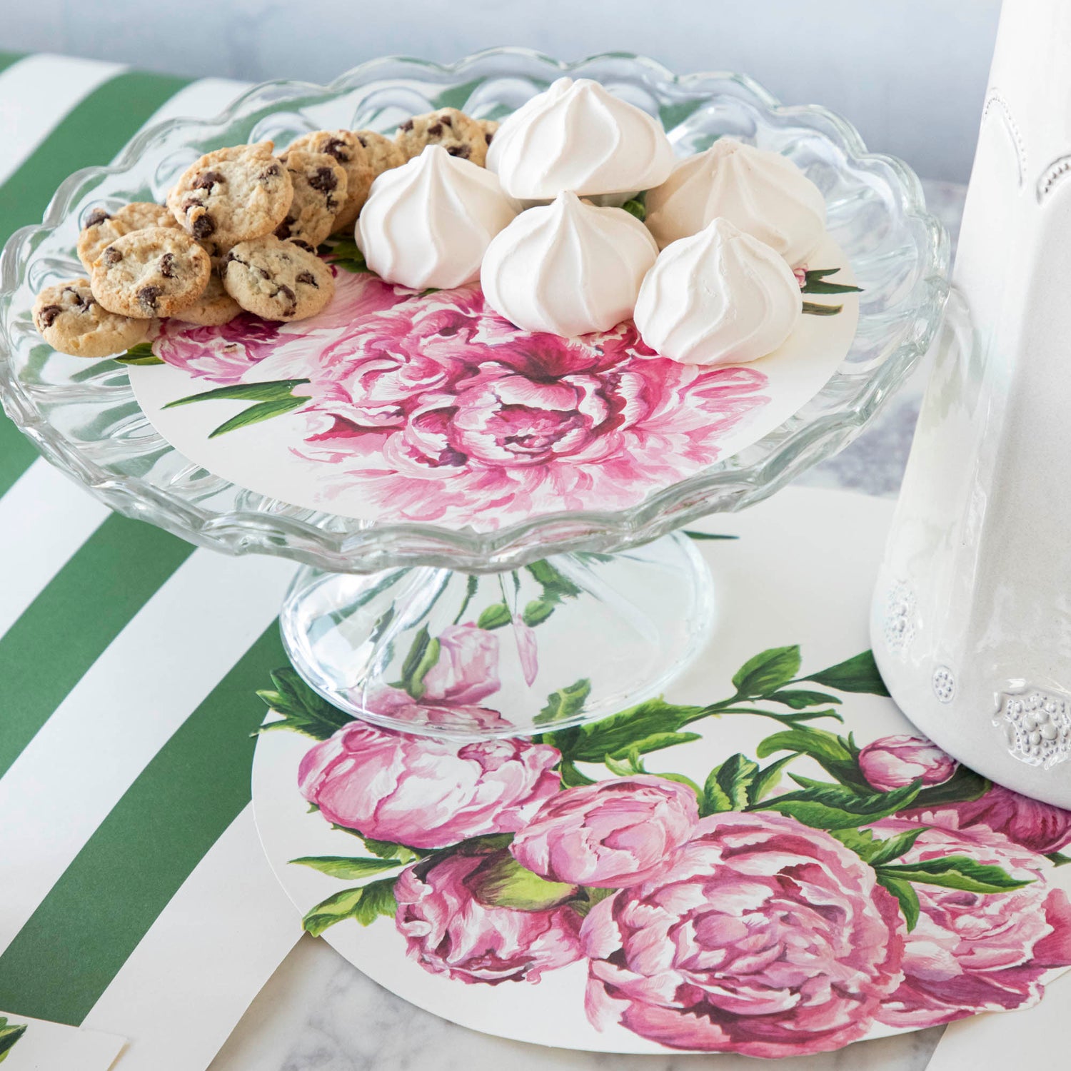 An elegant, floral treat spread featuring Peony Serving Papers under various cookies and treats.