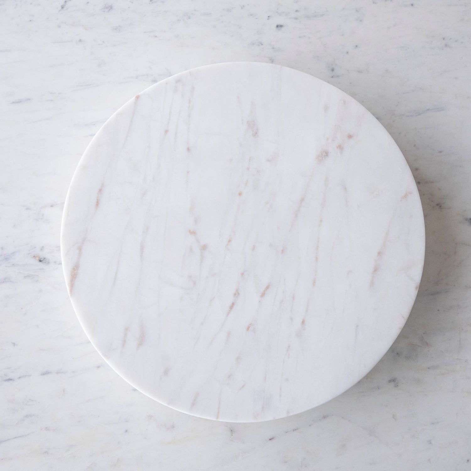 A White Marble Lazy Susan, 15&quot; Diameter with strawberries on it, perfect for your appetizer display.