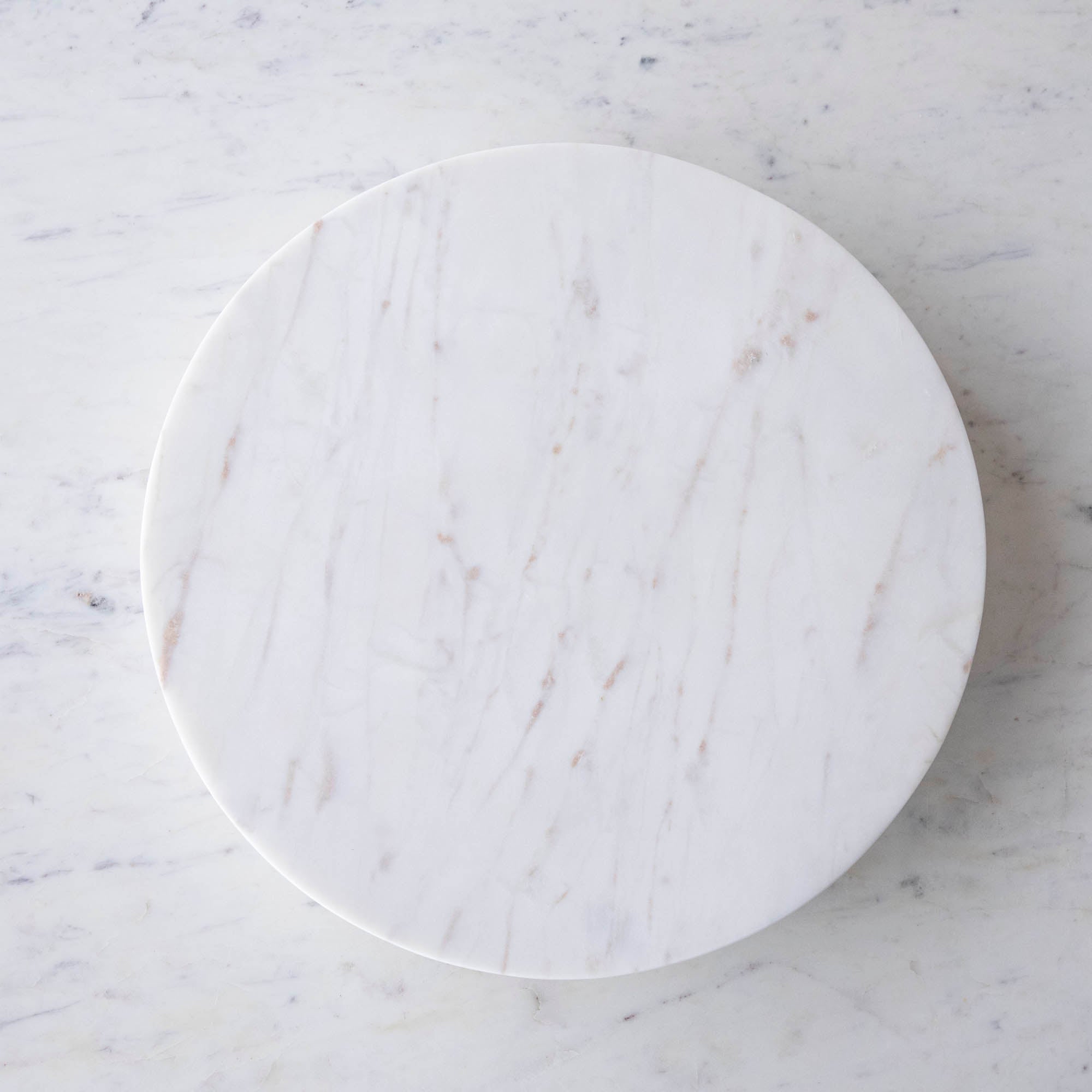 A White Marble Lazy Susan, 15&quot; Diameter with strawberries on it, perfect for your appetizer display.