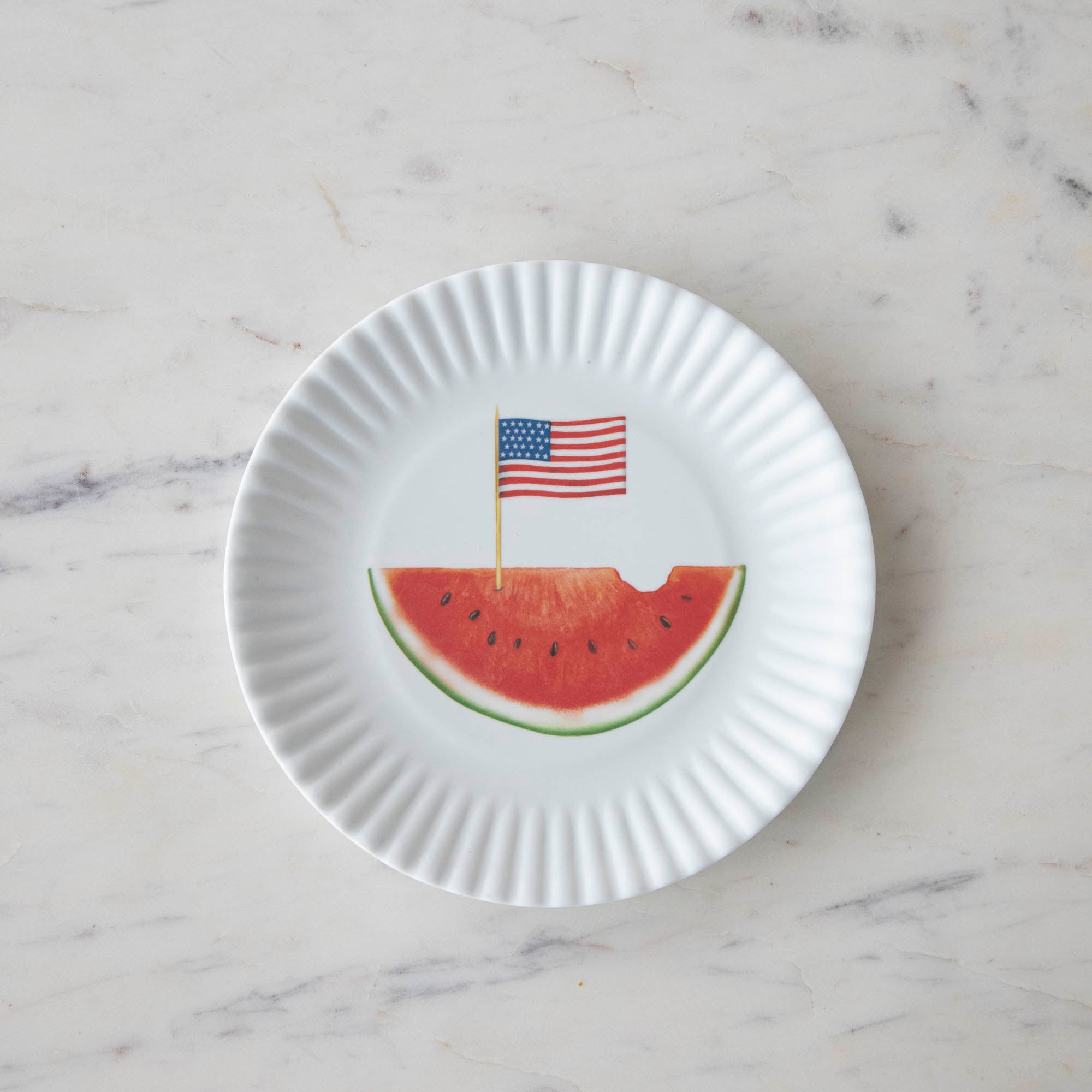 Disposable Melamine American Holiday Plates with Fourth of July-themed decorations on a white background from Glitterville.