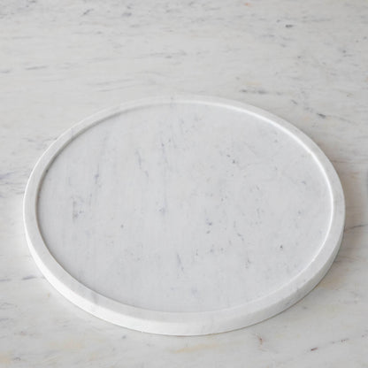 Chocolate muffins under a Bidk Home Marble &amp; Glass Food Dome with Knob, 11.5&quot; Diameter, presented on a white marble plate.