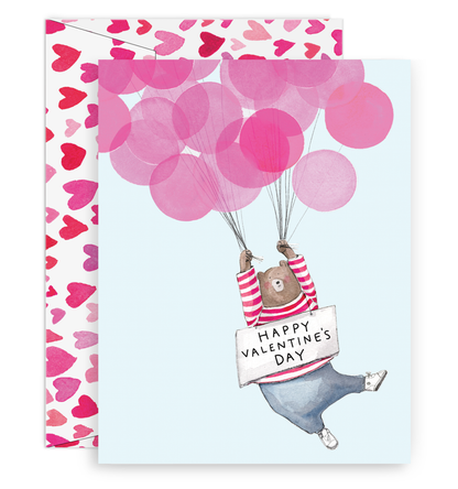 greeting card with illustration of a bear being carried off by pink balloons with a sign around his neck that says Happy Valentine&