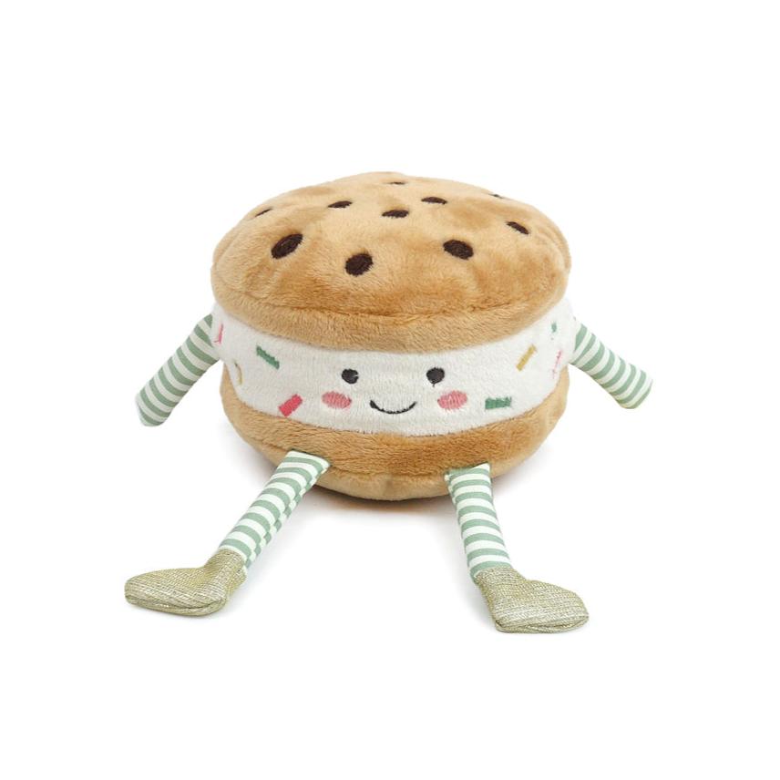 Mon Ami plush toy shaped like a cookie ice cream sandwich with striped arms and legs with a smiley face. 