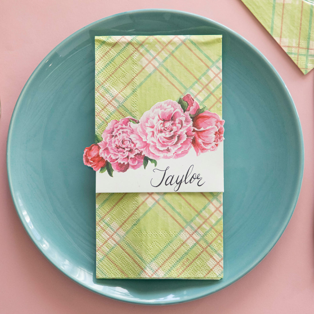 Bright Green Plaid Guest Napkin on a plate with the Peony Place Card on top.