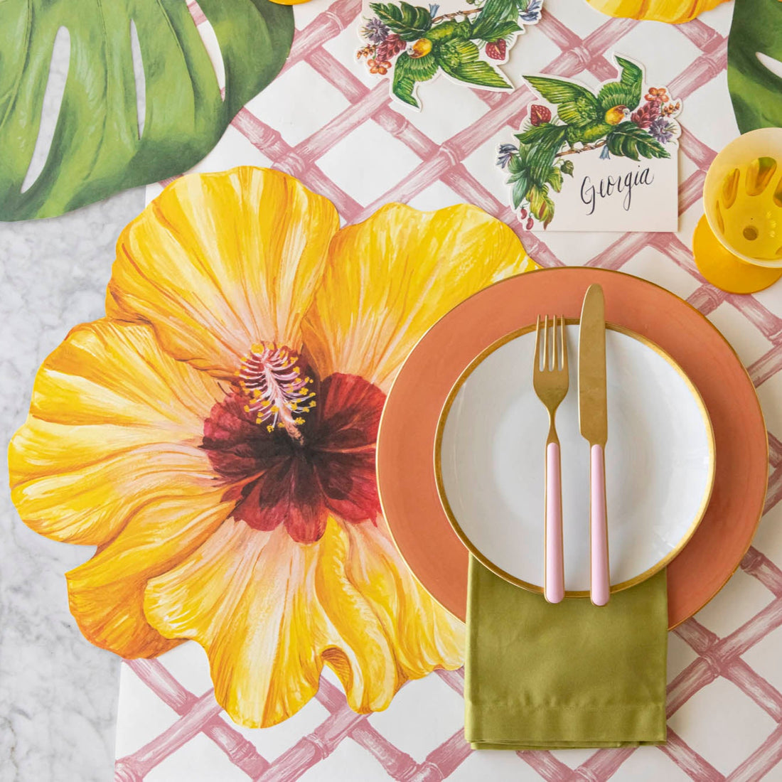 A tropical place setting with the Die-cut Hibiscus Placemat on the Pink Lattice Runner.