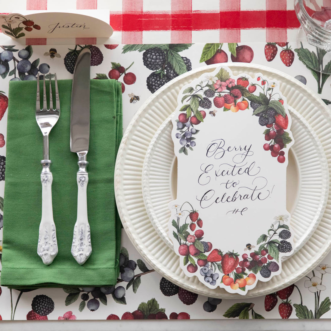 The Wild Berry Placemat under an elegant summertime place setting, from above.