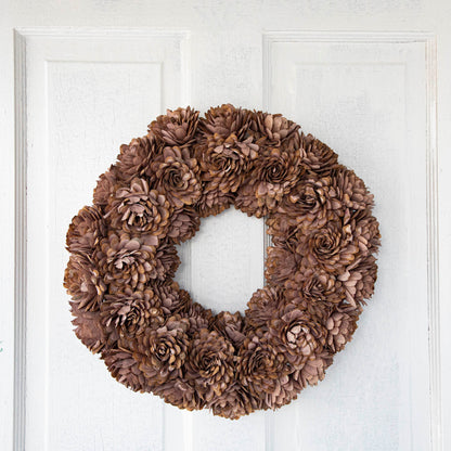 Blush Shola Almond Flower Wreath hanging on door