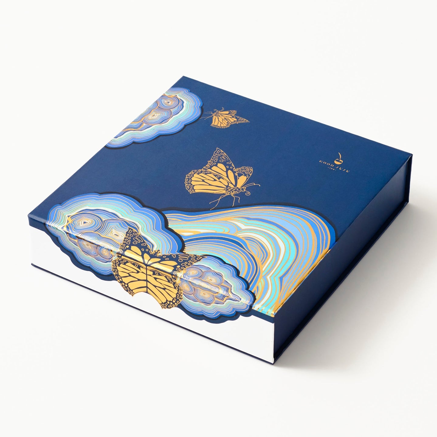 The Butterfly Effect card set featuring blue artwork with a gold butterfly on it. 