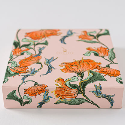 Hummingbird Luxury Stationery Set by Good Juju in pink with butterflies printed on it.