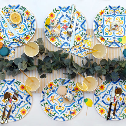 La Dolce Vita Paper Plates settings with cupcakes on them. 