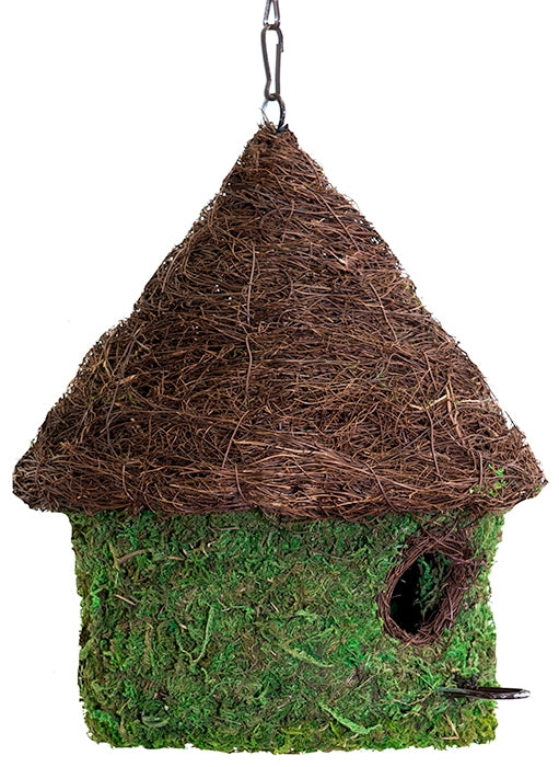 Bungalow Bird House made with moss on a table setting. 