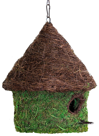 Bungalow Bird House made with moss on a table setting. 