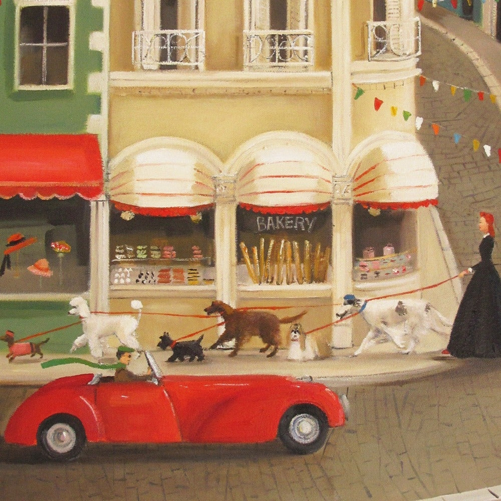 Art print featuring Janet Hills painting depicting a city street where a woman is walking a line of dogs all in a row in front of a bakery. 