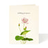 Greeting card by Felix Doolittle with artwork depicting a single pink flower and the sentiment above saying "wishing you peace".