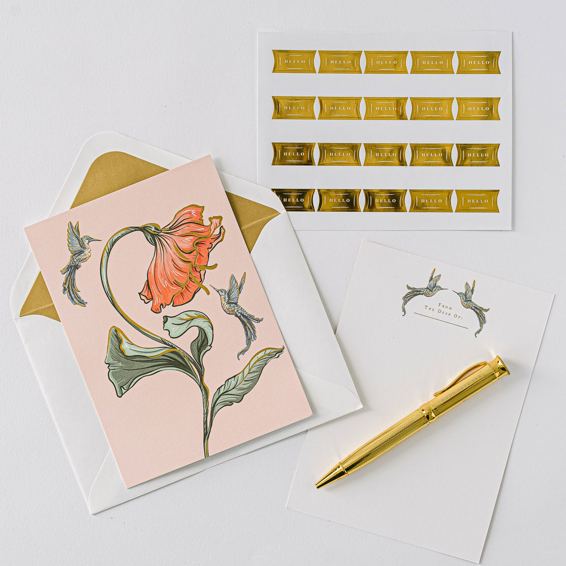 Hummingbird Luxury Stationery Set by Good Juju in pink with butterflies printed on it.