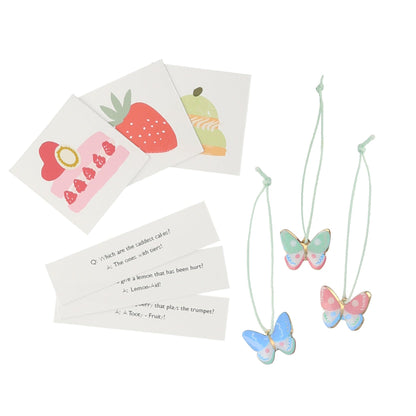 A set of Meri Meri Ladurée Paris Macaron Surprise Balls adorned with butterflies.